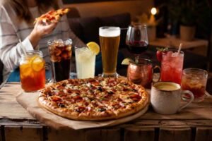 15 Drinks Everyone Loves With Pizza That Always Hit the Spot