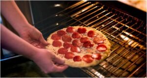 how to cook frozen pizza so it tastes better